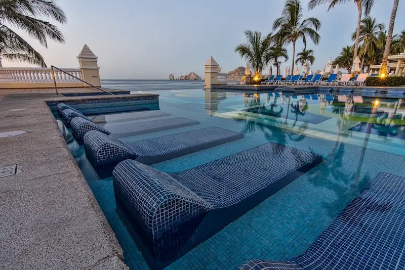 beautiful resort with blue sun bathing chairs