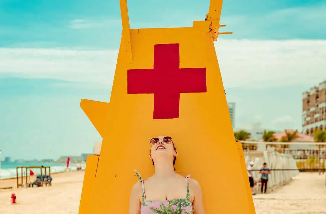 woman by a lifeguard stand